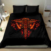 Black bedding set with flaming skull face print on duvet and two black pillowcases