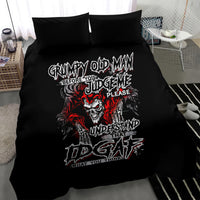 Black bedding set with skull-and-flames quote graphic on duvet and two pillowcases
