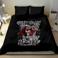 Black duvet cover and two pillowcases with skull, red flames, and bold typography