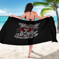 Black skull sarong with bold graphic print, draped wide on back view