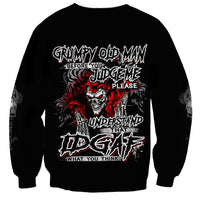 Black unisex sweatshirt with large skull graphic and layered slogan print