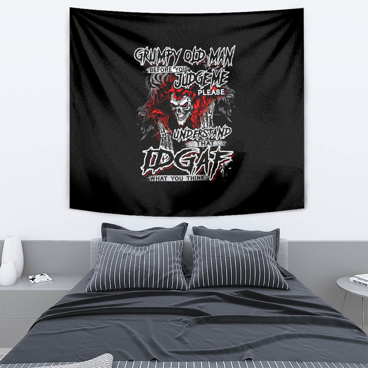 Black tapestry with skull and graffiti-style text graphic