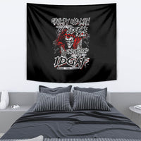 Black tapestry with skull and graffiti-style text graphic