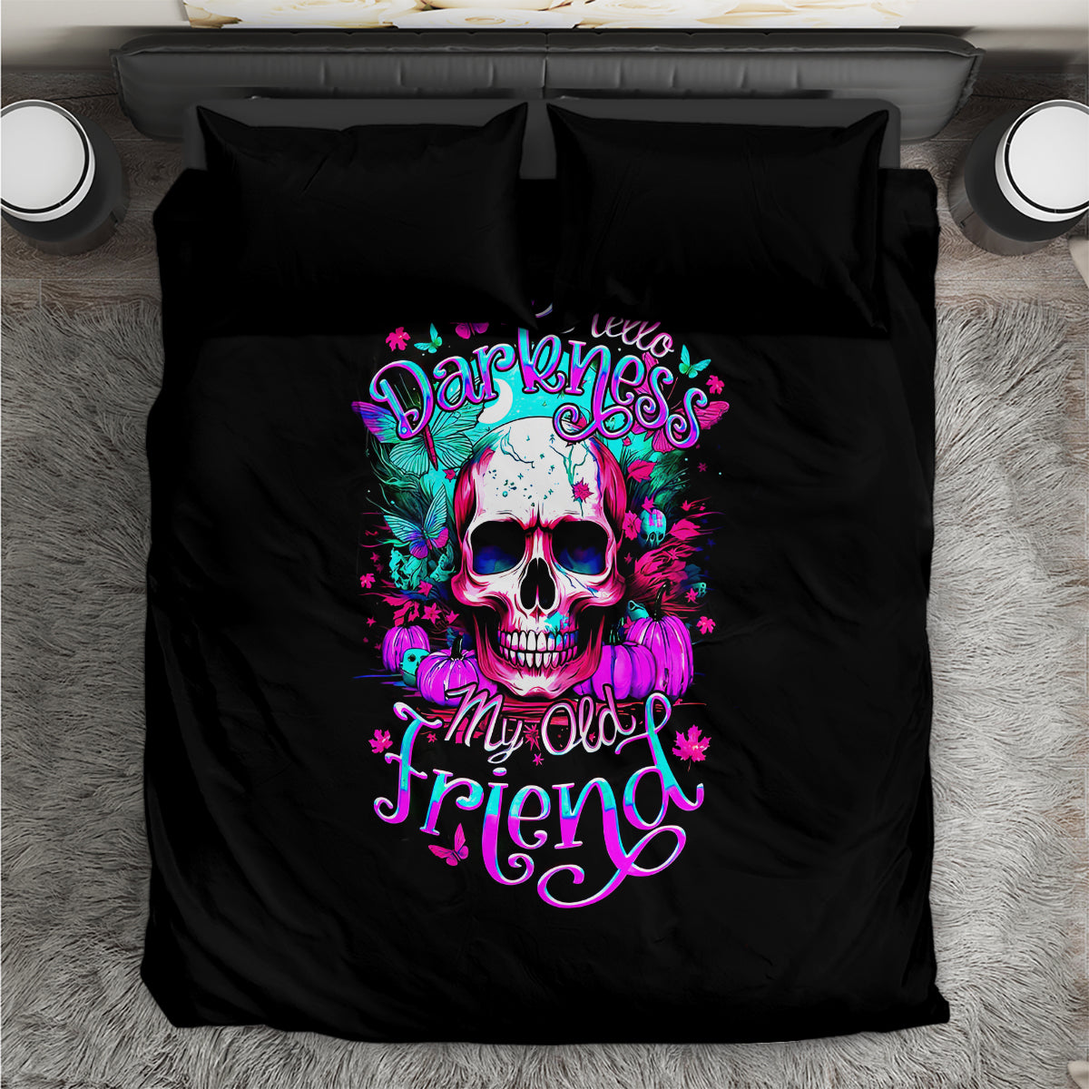 Black bedding set with centered skull artwork and two matching pillowcases
