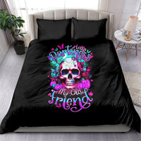 Black bedding set with colorful skull graphic and pink teal lettering on duvet