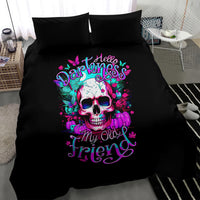 Black bedding set with skull graphic duvet and two dark pillowcases in view
