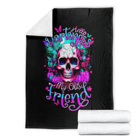 Black skull graphic blanket with “Hello Darkness My Old Friend” lettering, folded with white rolls