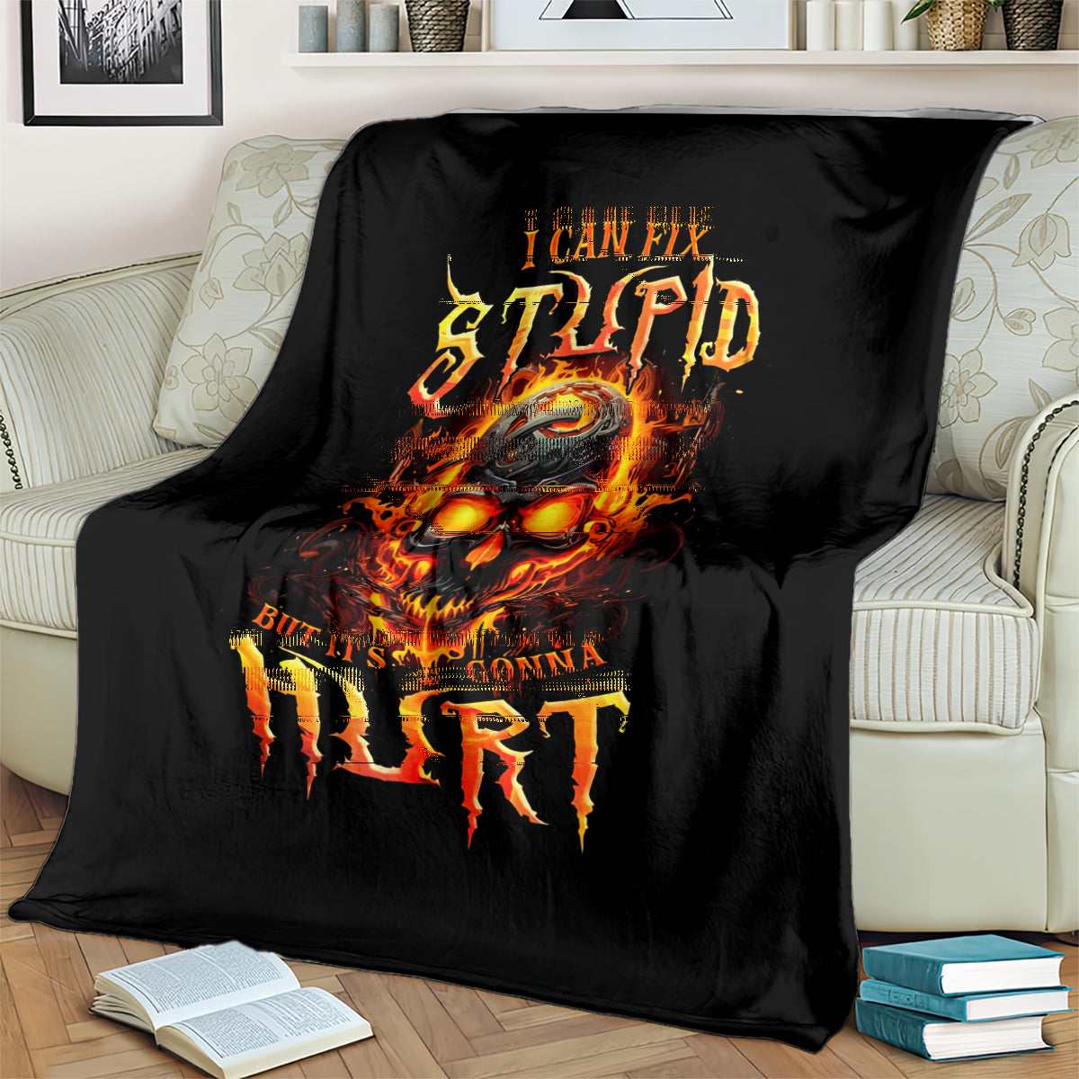 Black throw blanket featuring flame skull artwork and bold distressed text.