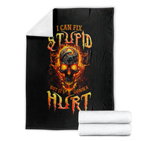 Black flame skull graphic blanket shown folded, with matching fiery skull text.