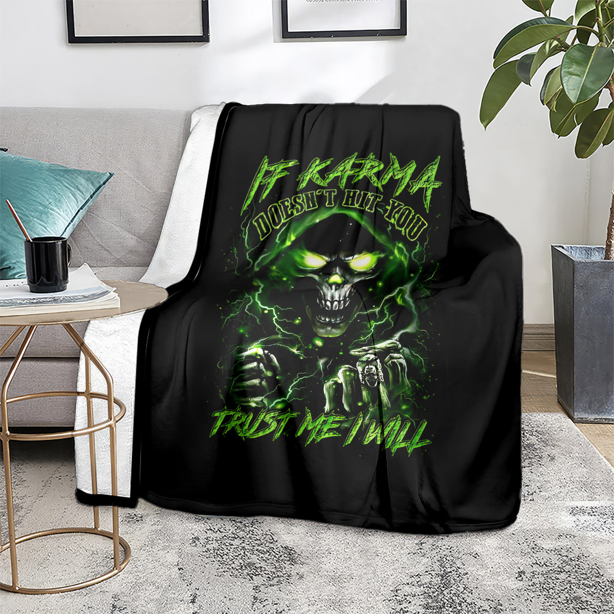 Black skull graphic throw blanket with neon green glowing eyes and text