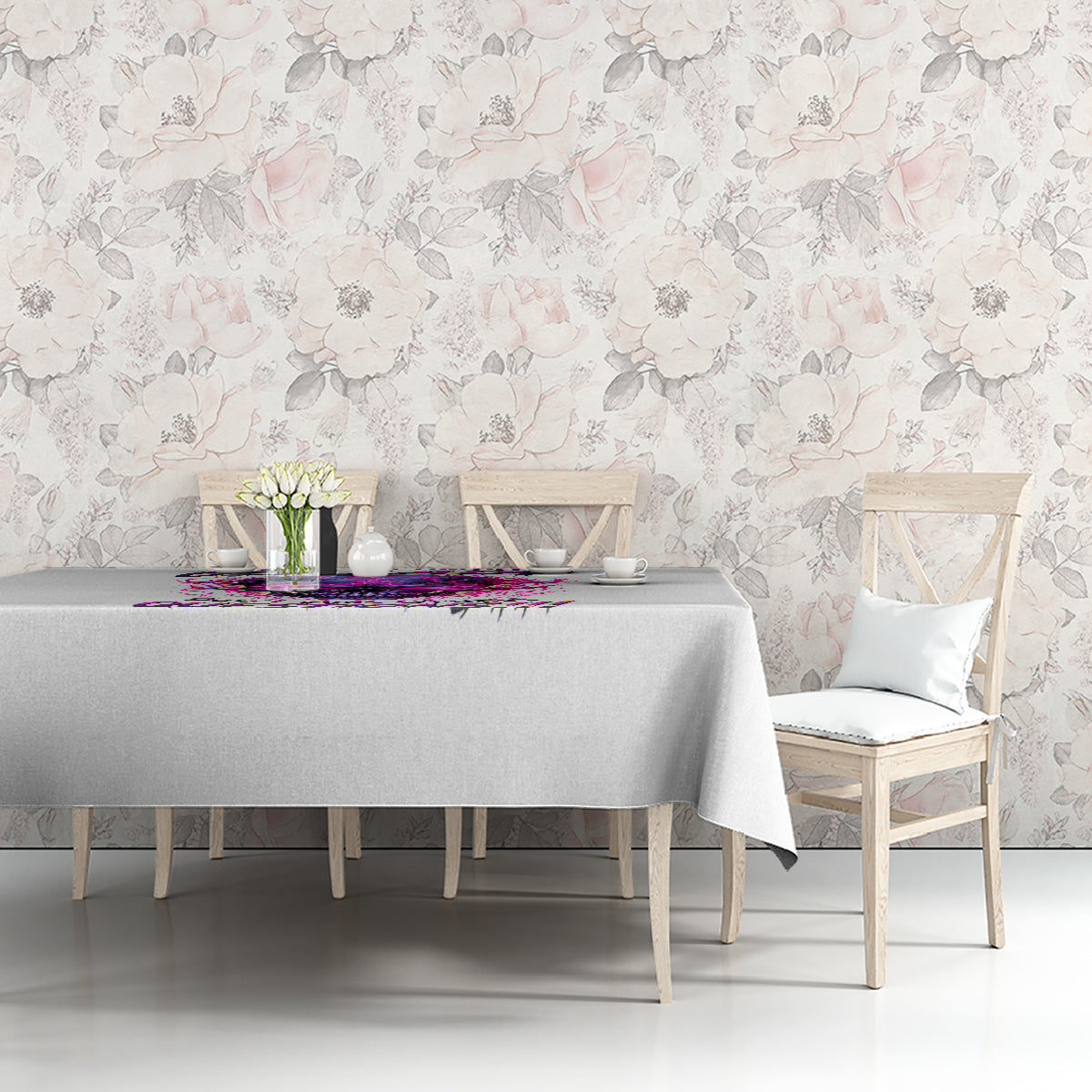 Gray tablecloth with purple skull graphic across the top edge