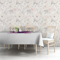 Gray tablecloth with purple skull graphic across the top edge