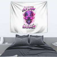 Grumpy skull wall tapestry with purple-pink neon print and slogan text on white cloth