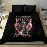 Black bedding set with angel skull and roses graphic on duvet, paired with two pillows