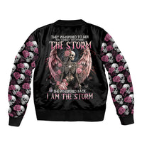Black bomber jacket with ribbed collar, large angel-skull graphic on back, floral sleeves