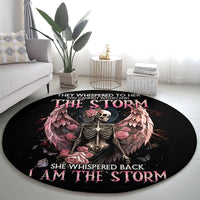 Round black gothic carpet with angel-skull skeleton and pink rose wings artwork.