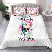White bedding set with watercolor skull and colorful floral butterfly graphics, matching pillows