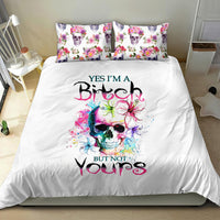 White duvet and two pillowcases with watercolor skull, colorful flowers, and butterfly artwork