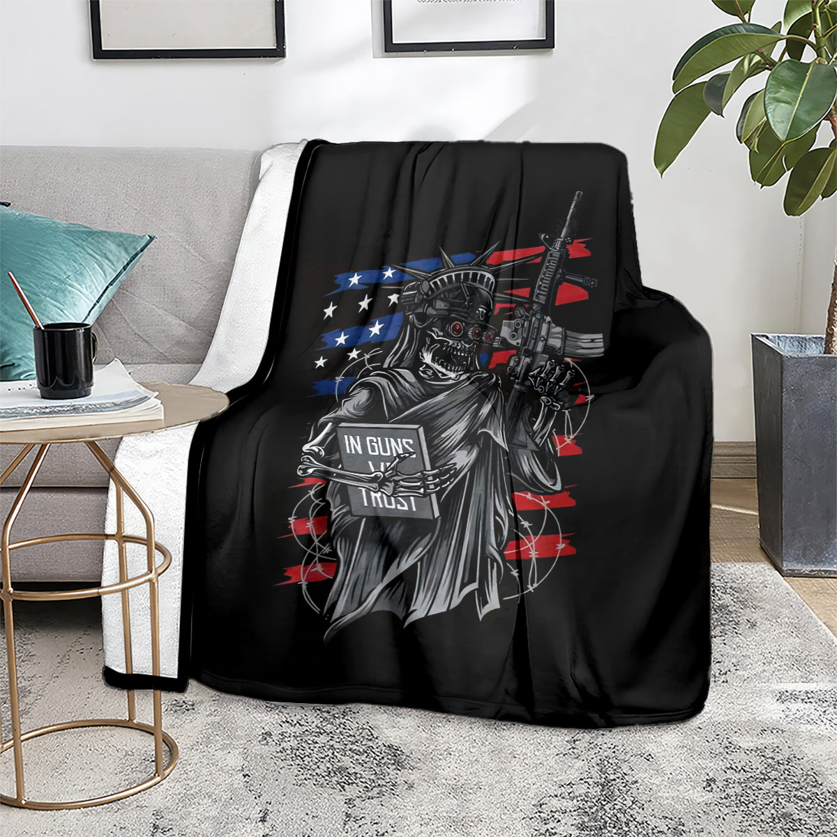 Black skull freedom graphic blanket laid across a sofa seat
