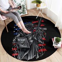 Round black graphic carpet with gun-and-skull rider illustration, red and blue accents