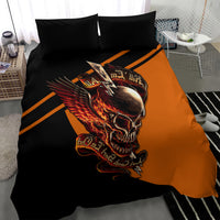 Black-and-orange skull wing bedding set featuring bold central skull graphic and duvet