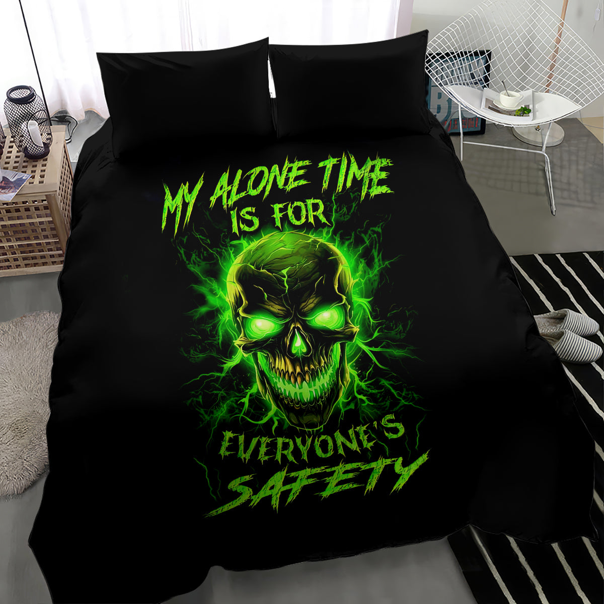 Black bedding set with neon green skull flame artwork on the duvet and pillow shams