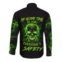 Black long-sleeve button shirt, neon green skull graphic on back