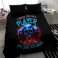 Black bedding set with blue skull and "I'm the coach" typography on duvet and pillows