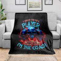 Black skull graphic blanket with PLAYer and Nice to meet you text on sofa
