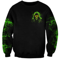 Black unisex sweatshirt with small chest green skull design