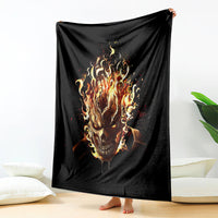 Black flame skull blanket with fiery skull graphic, draped front and center