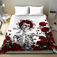 White duvet cover bedding set with red rose border and skeleton skull print, matching pillows