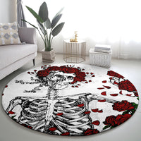 Round area rug featuring black skeleton torso with red rose details