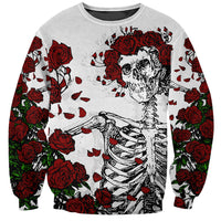 White unisex sweatshirt with skull and red roses graphic, long sleeves