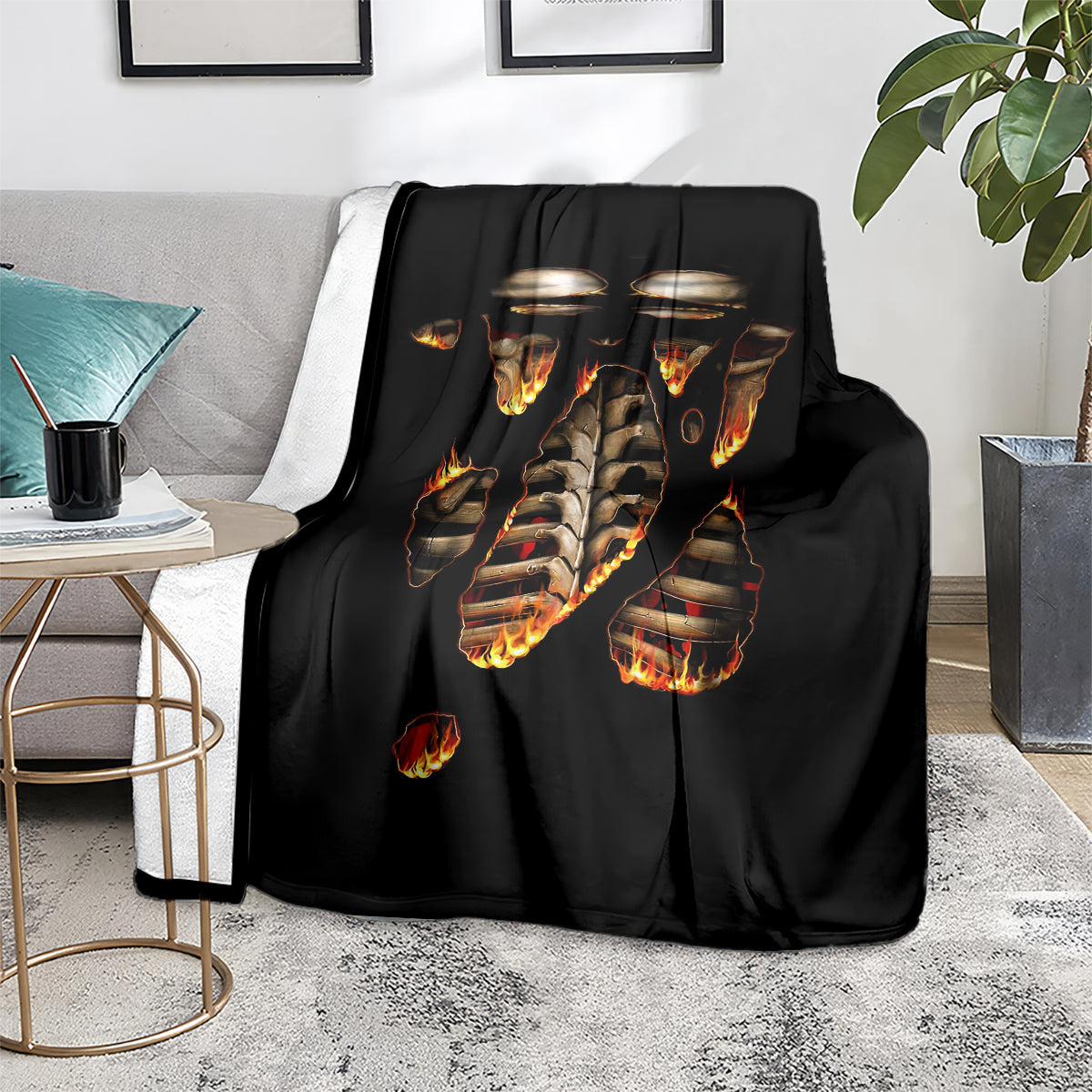 Black flame skull skeleton inside body throw blanket on a chair