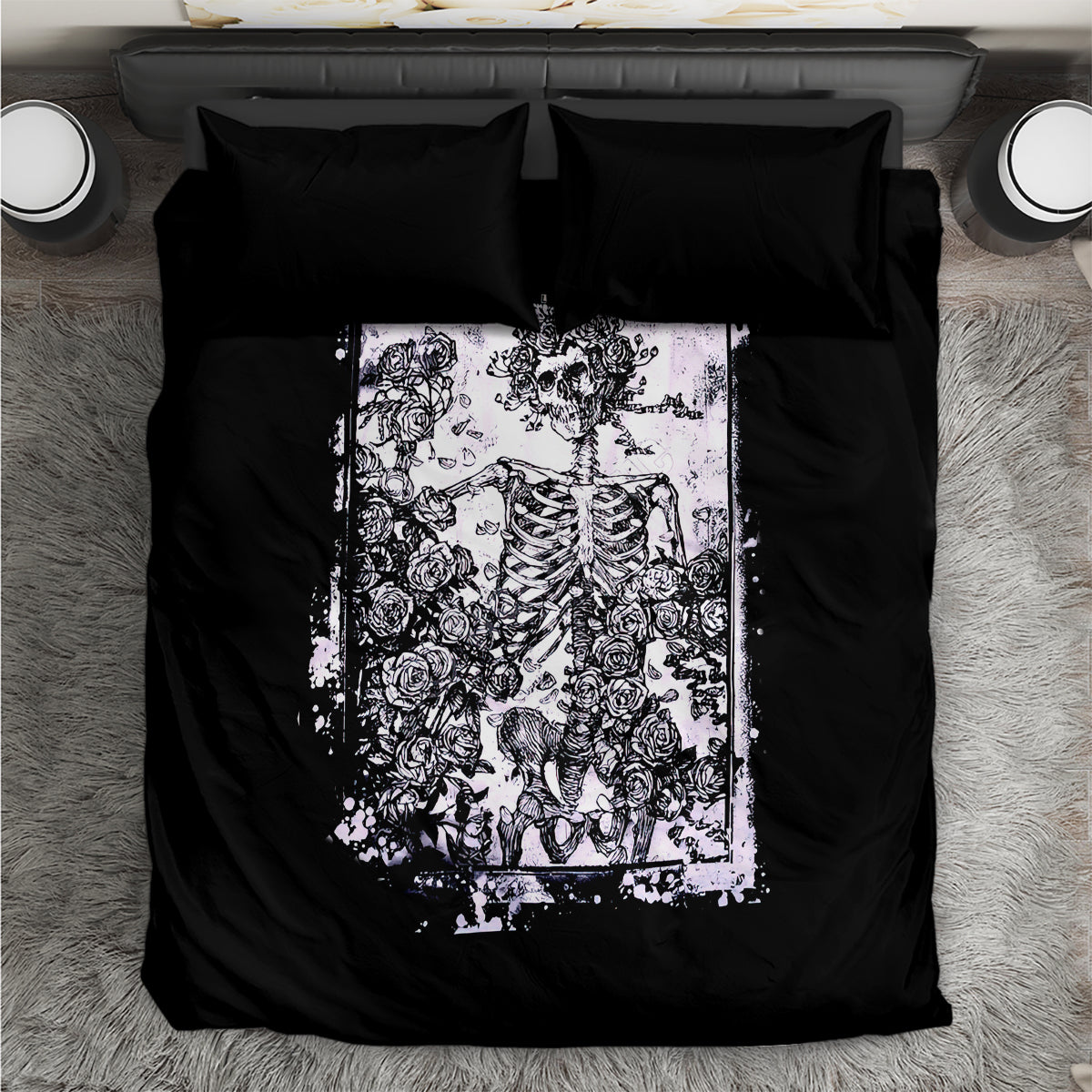 Black bedding set with white skull and skeleton rose graphic, two black pillowcases