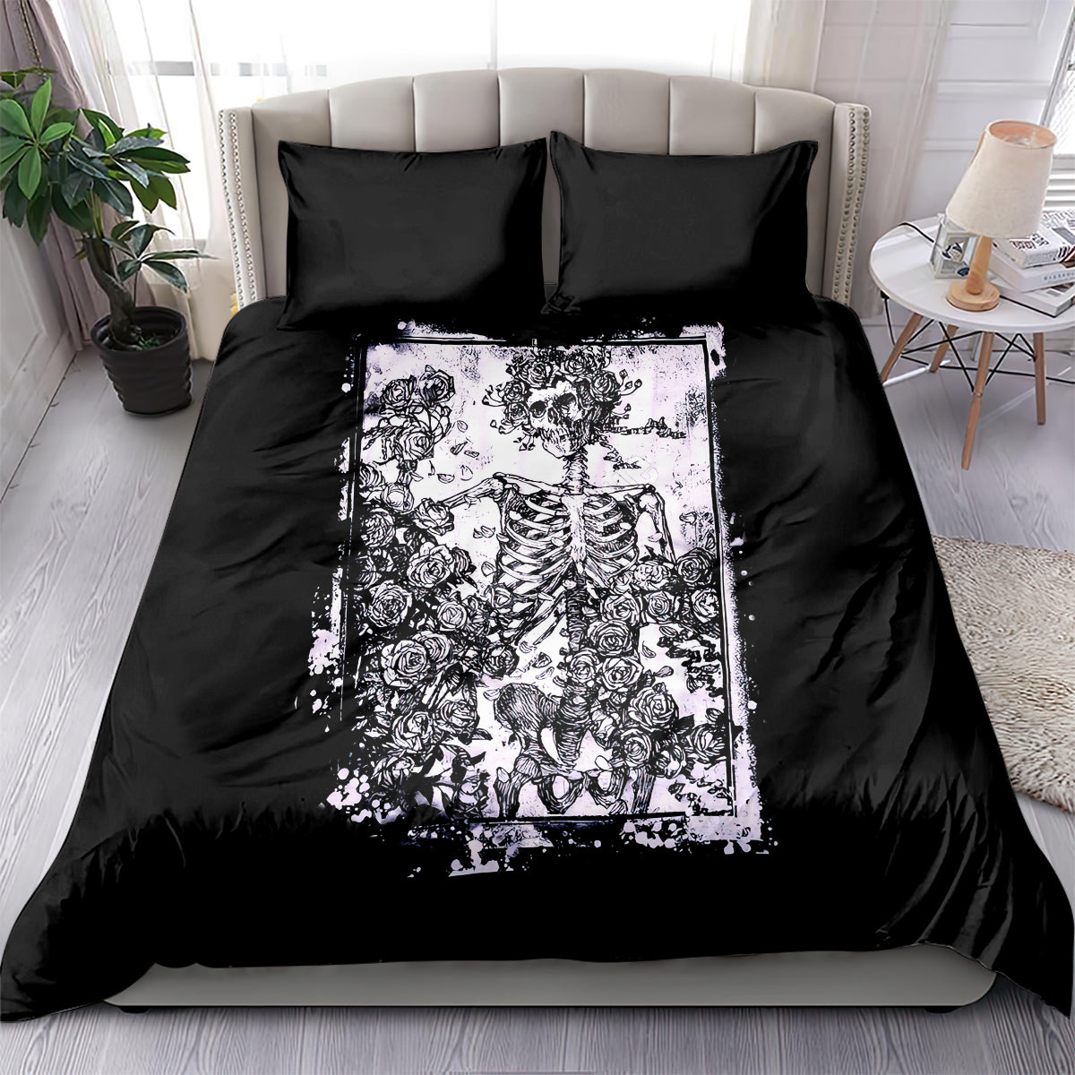 Black duvet cover with white skull and skeleton surrounded by roses, matching black pillows