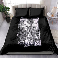 Black duvet cover with white skull and skeleton surrounded by roses, matching black pillows