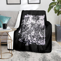 Black skull and rose blanket with white Day of the Dead-style illustration