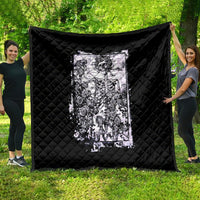 Black quilt with centered white skeleton skull artwork, quilted diamond pattern