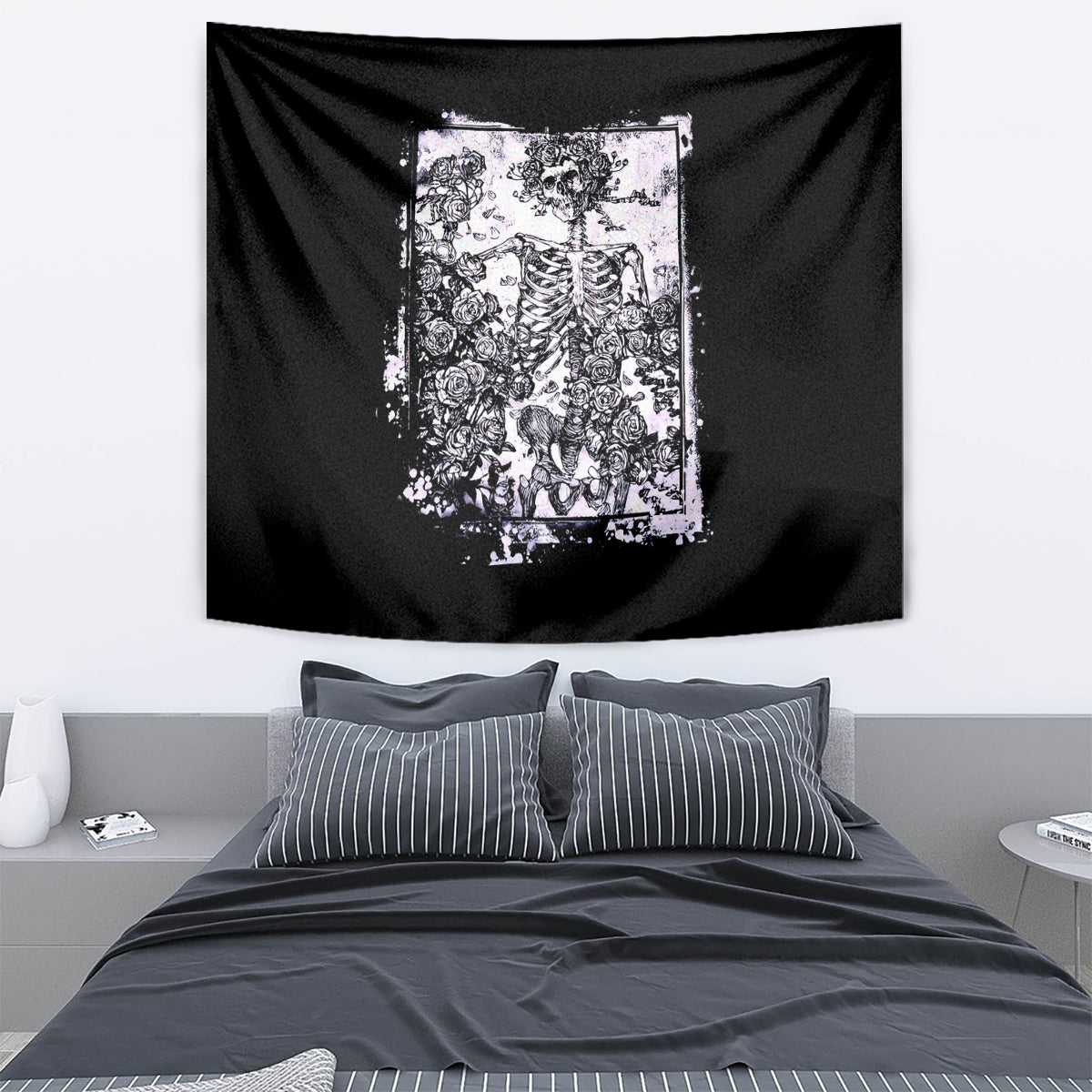 Black skull tapestry featuring centered white skeleton and roses artwork