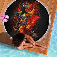 Round black beach blanket with fiery skeleton skull graphic, white fringed edge, 150cm