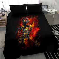 Black duvet cover bedding set with large fiery skeleton skull artwork and two pillows