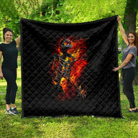 Black quilt throw with centered fiery skeleton skull artwork