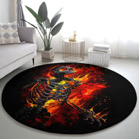 Round black fire skeleton rug featuring a dramatic flaming skull figure