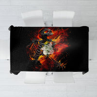 Black square tablecloth with fiery skull skeleton graphic in orange and red flames