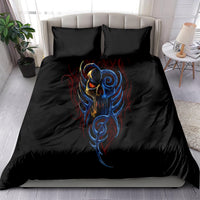 Black bedding set on bed with devil skull face graphic and two matching pillowcases