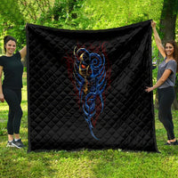 Black quilted blanket featuring a blue devil skull face with red flame accents