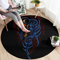 Round black devil skull rug with blue screaming face and red accent swirls