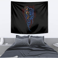Black devil face tapestry, stylized screaming head in blue and orange, rectangular cloth.